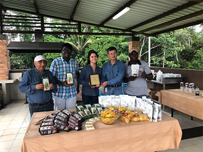 Receiving a gratitude plate for helping a local cacao producer in the promotion of his products in the capital and the establishment of a sustainable supply chain with small farmers