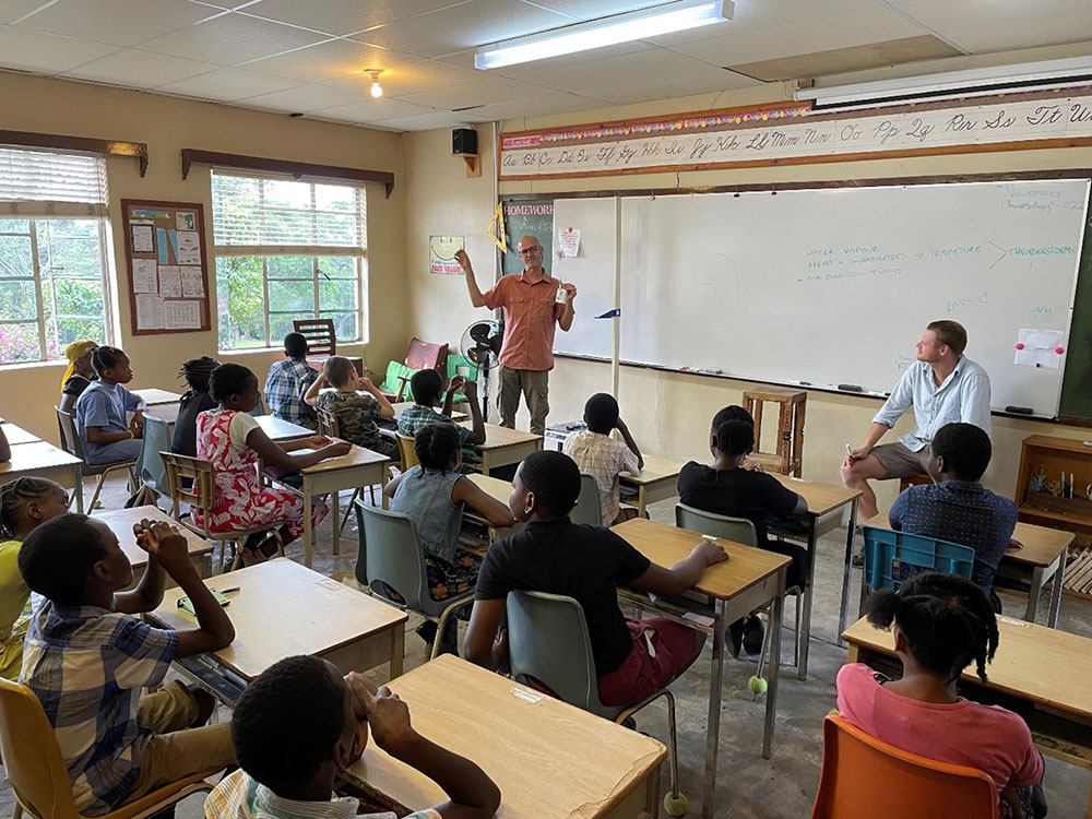 Dr Sebastian Engelstaedter and Dr Callum Munday teaching a class at Sakeji Mission school, NW Zambia
