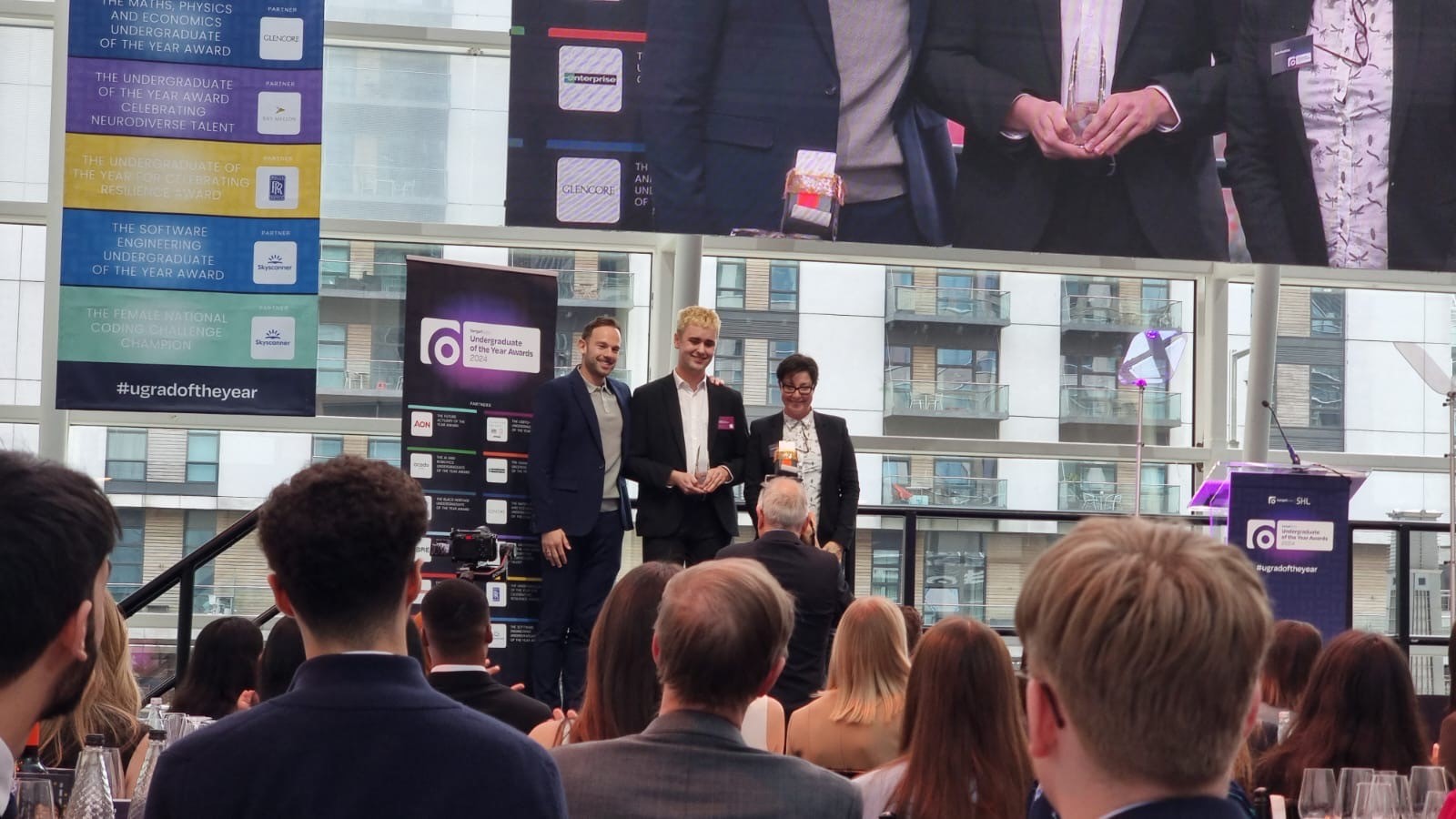 Alfie Davis accepting award.