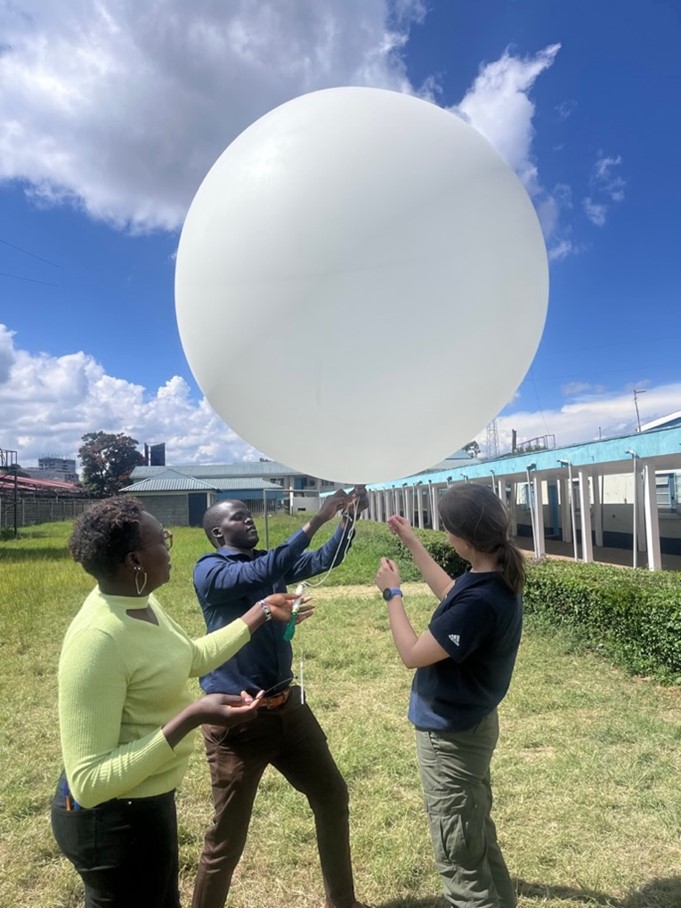 Abi Jones (Bristol, former Geography undergraduate at Teddy Hall), Joseph Ouma (KMD) and Maria Kiboi (UoN) release weather balloon from KMD headquarters in Nairobi (photo: Callum Munday)