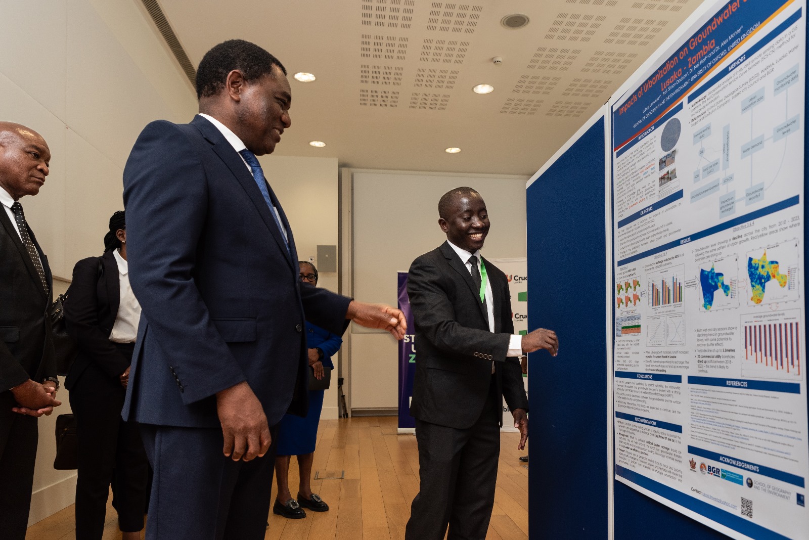 Lubasi Limweta presenting his research to the President of Zambia