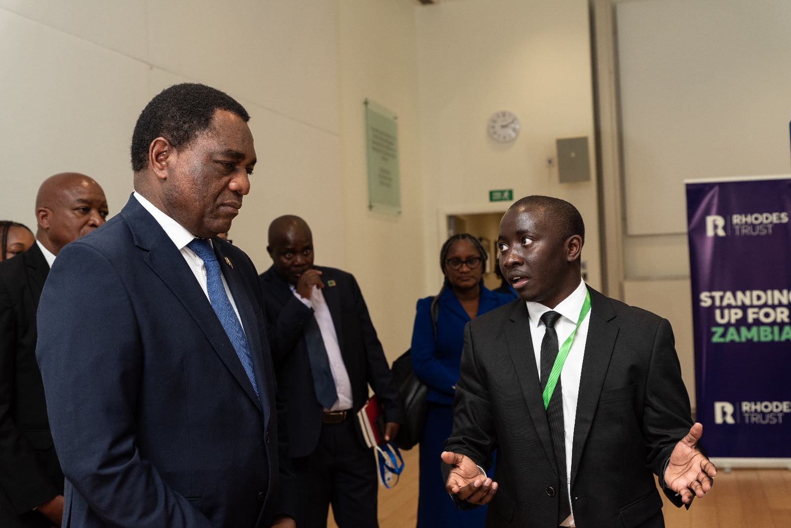 Lubasi Limweta presenting his research to the President of Zambia