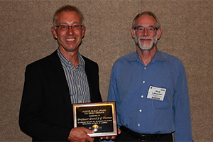 Receiving the Farouk El-Baz Award at the 2011 GSA conference, presented by Prof Nick Lancaster