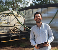 Esteban Boj Garcia, with a water tanker