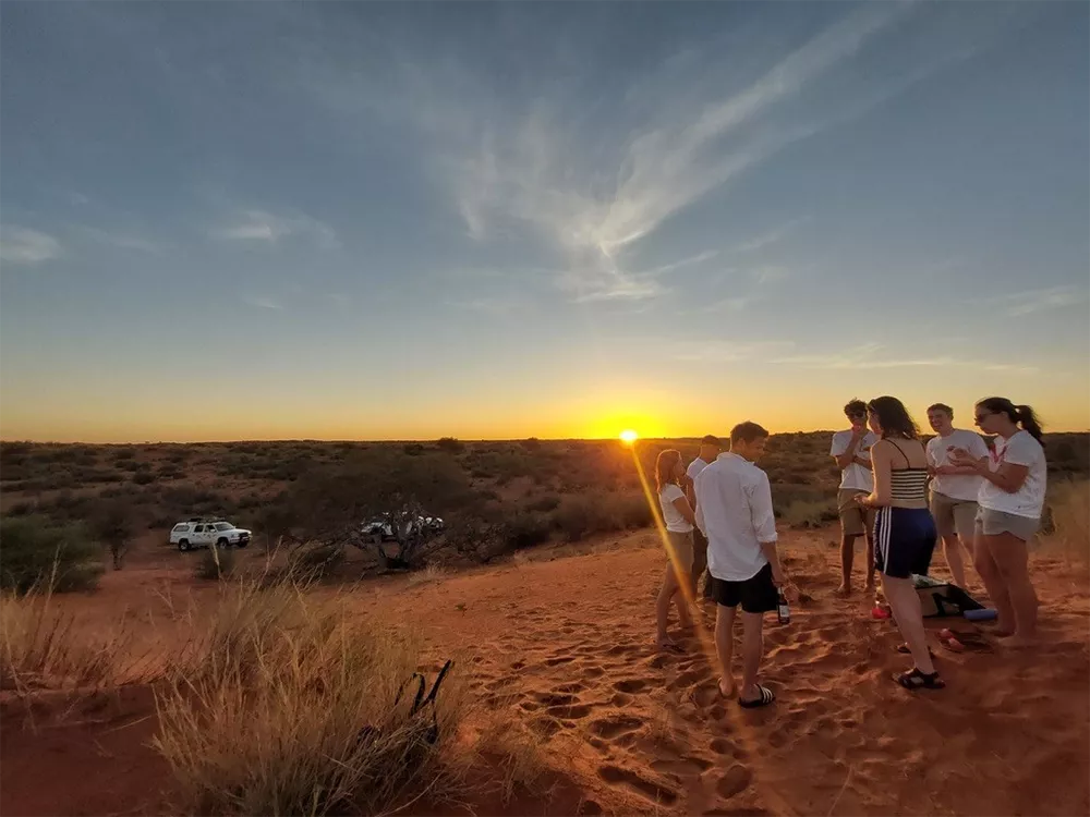 Kitty Attwood (SoGE DPhil), Sebastian Engelstaedter (SoGE staff), Callum Munday (SoGE postdoc), Eoin Ware (SoGE undergraduate), Siri Pederson Gamming (SoGE undergraduate), Jamie Todd (SoGE undergraduate) and Elisenda Henderson (SoGE undergraduate) watch the sunset over the dunes.