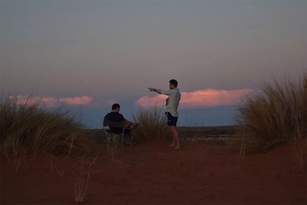 Charlie Knight and Callum Munday looking out at convective clouds over Botswana.
