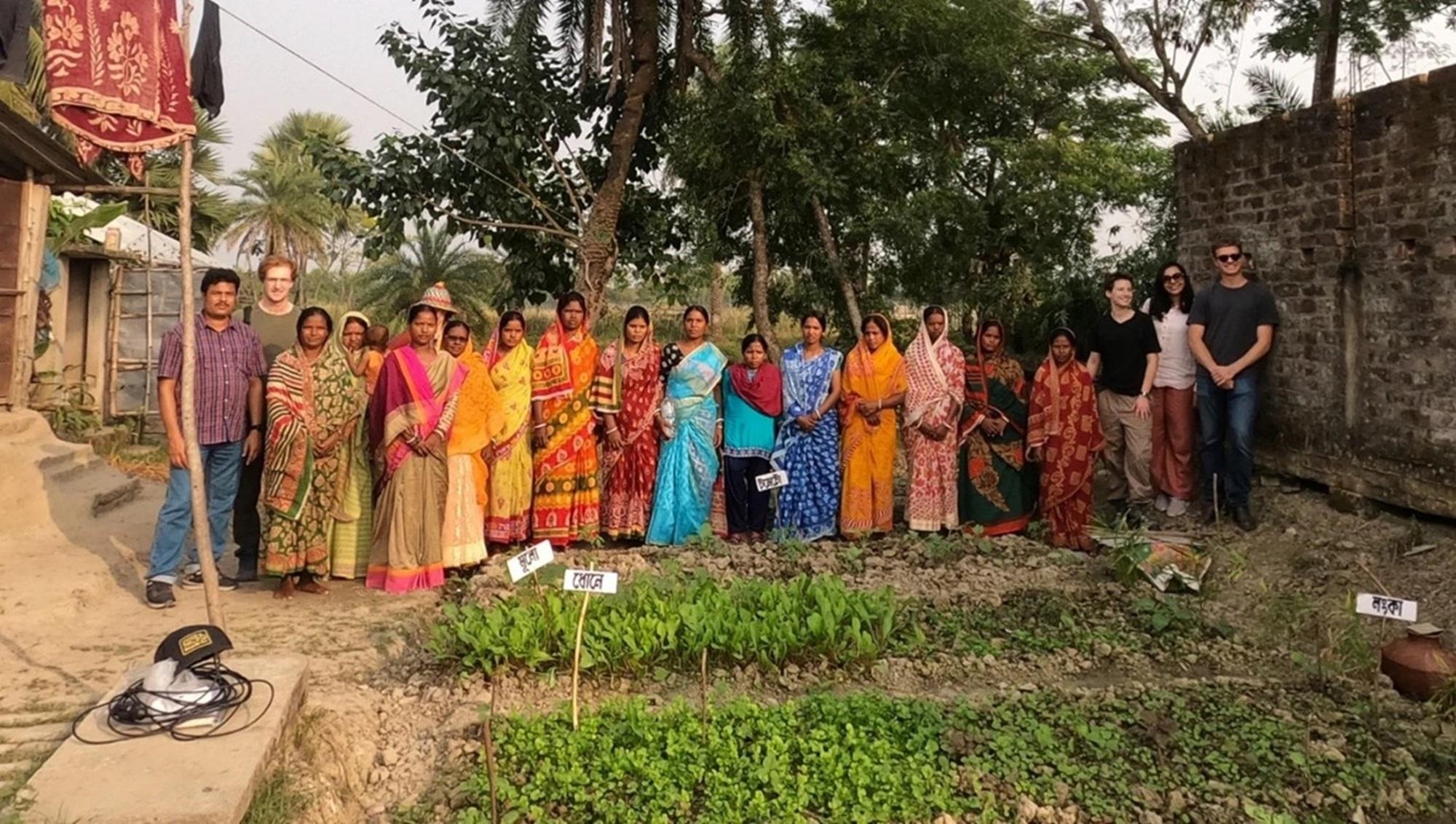 A group of people at a water project in West Bengal, India