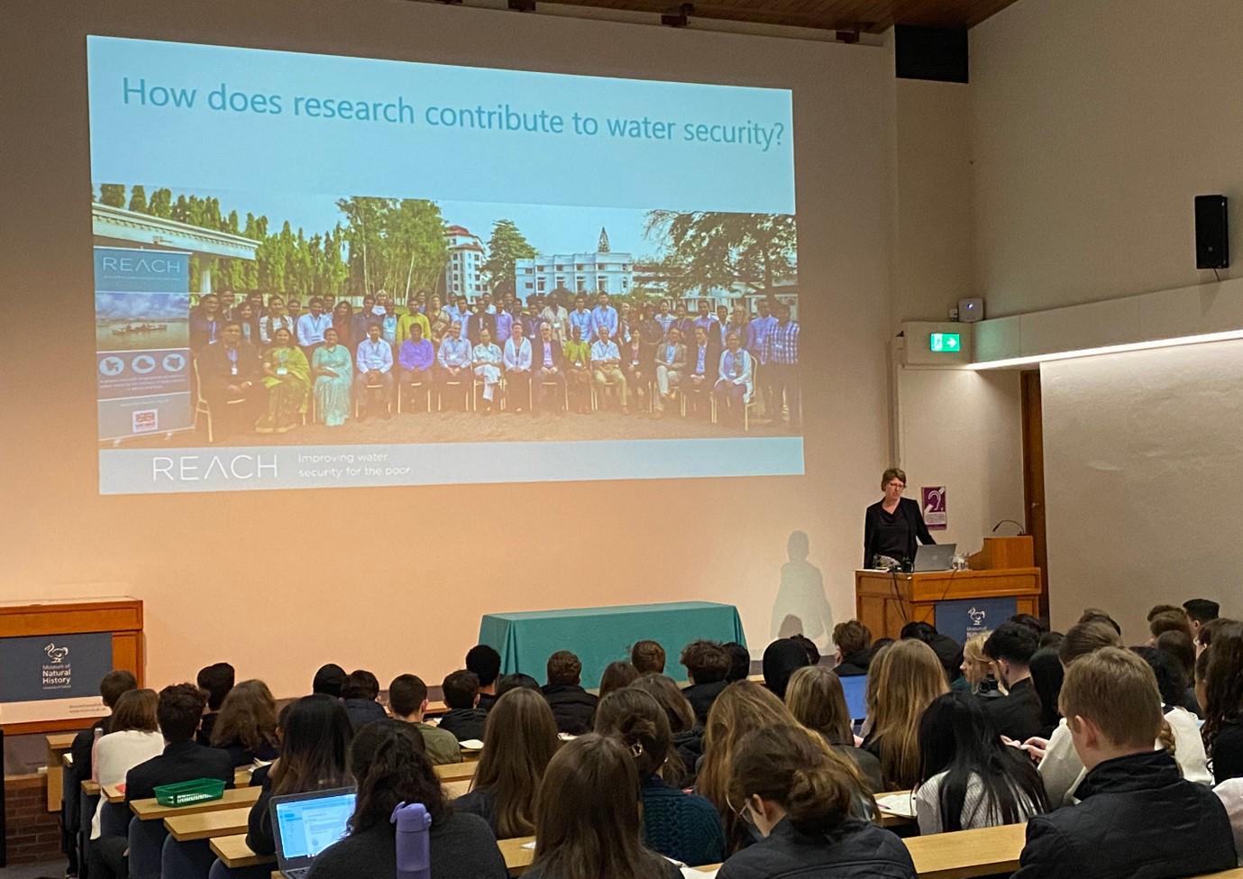 Nancy Gladstone presenting to school students.