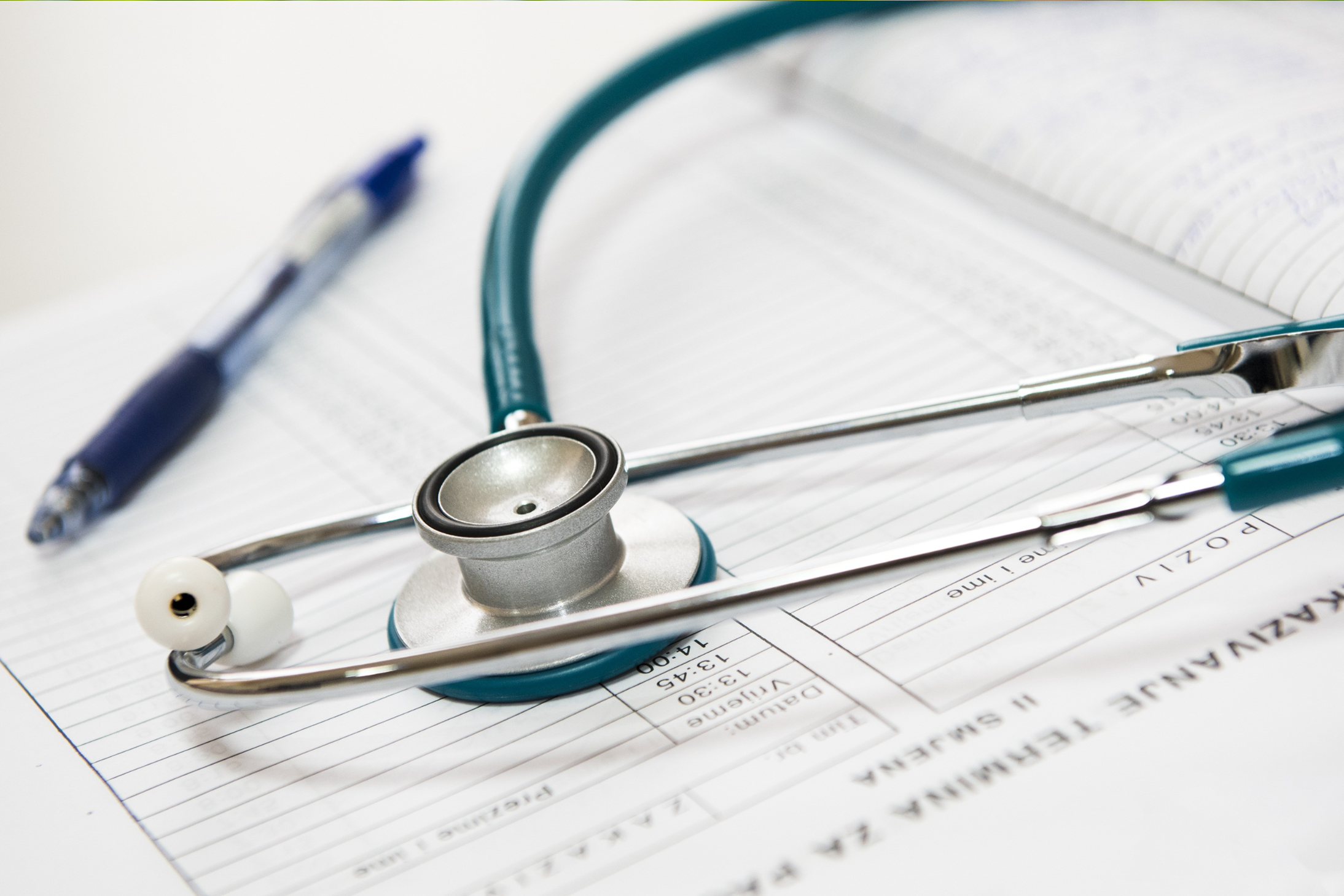Stethoscope and patient file. Stock image from Canva.