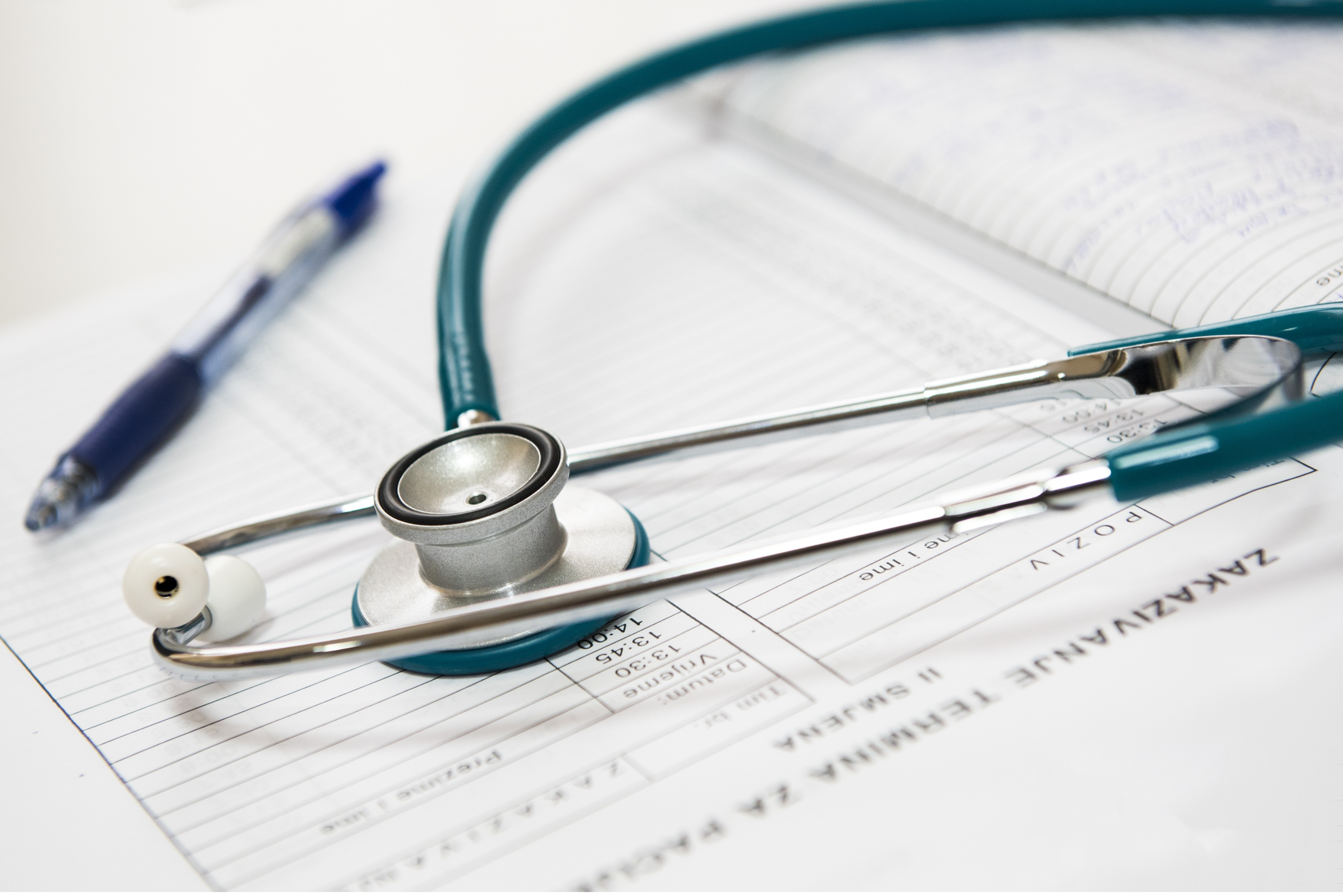 Stethoscope and patient file. Stock image from Canva.