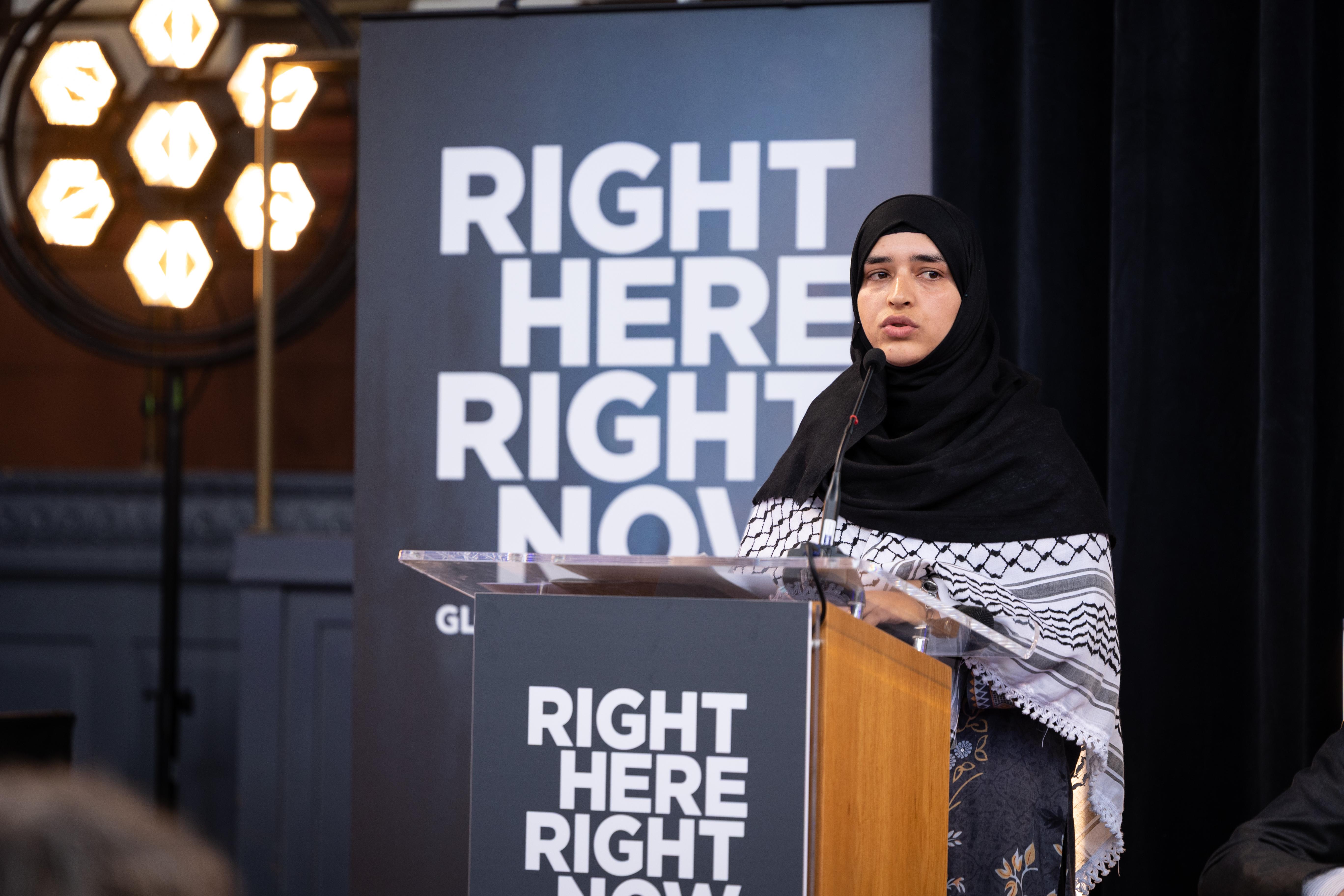 Tabina Manzoor delivers opening speech at summit. Credit: Cyrus Mower @cyrusoxford