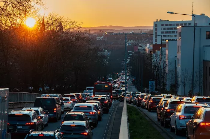 Heavy traffic in an urban area at sunset